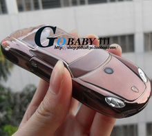 Unlocked Russian keyboard 2013 low price cool Luxury Gift F977 cell phone small Sport Car model