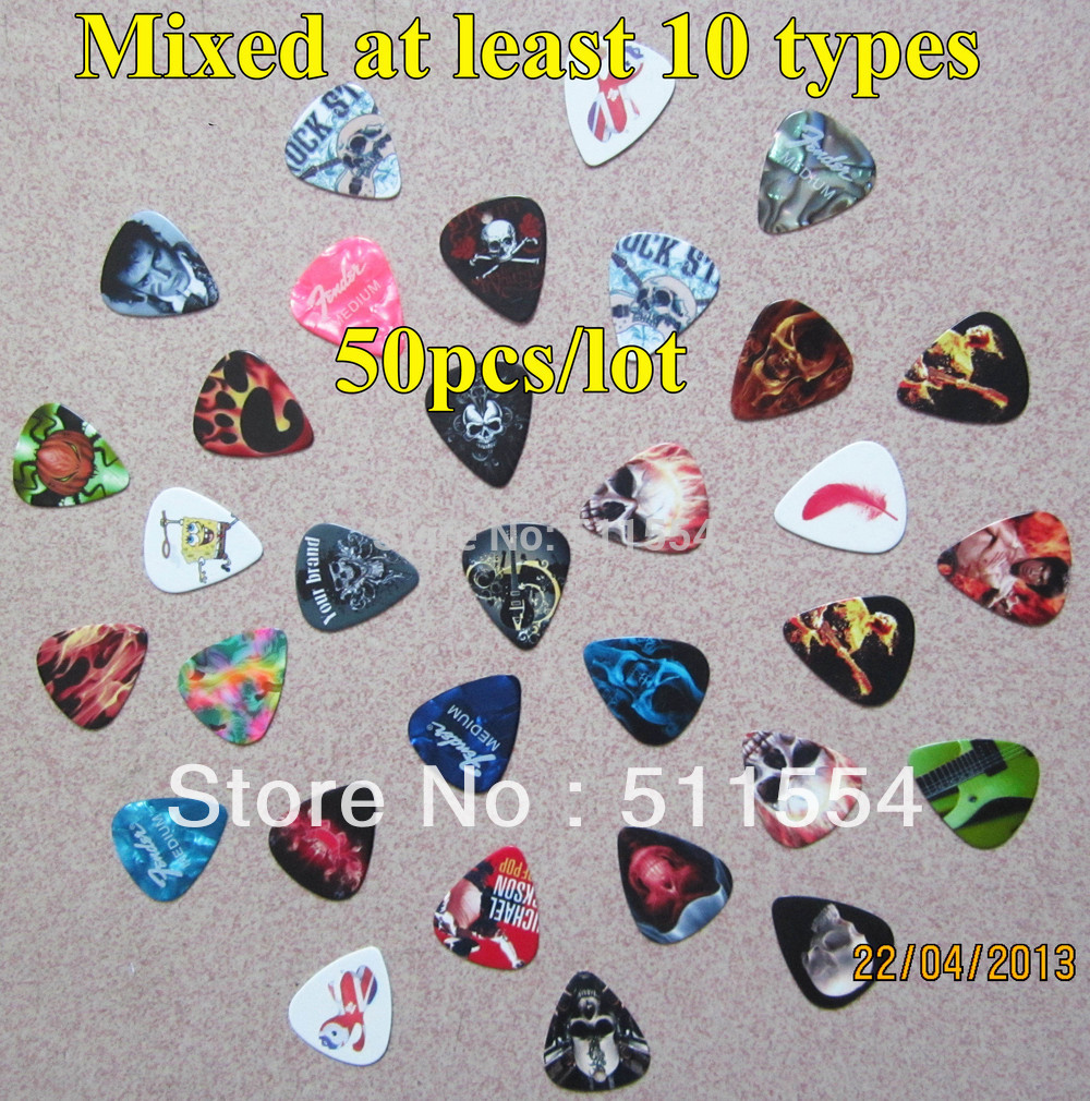 Top sale Mixed Thickness Celluloid Guitar Picks at the lowest price,Free shipping for 50pcs Guitar Picks Plectrums(China (Mainland))